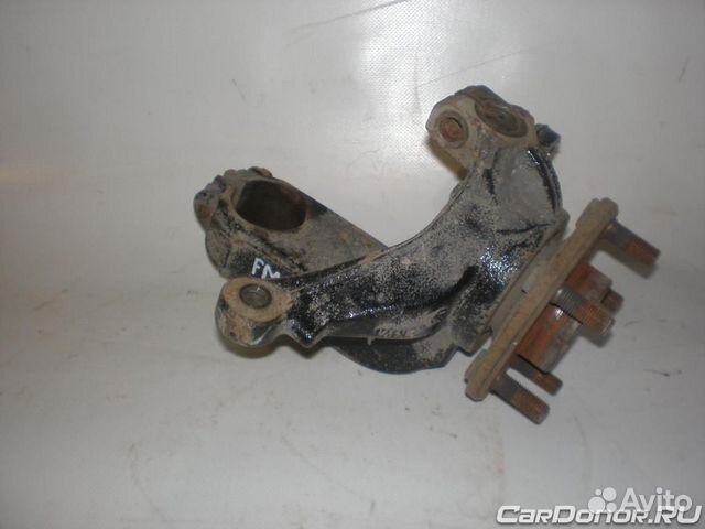 Кулак поворотный в сборе передний левый (цапфа) б