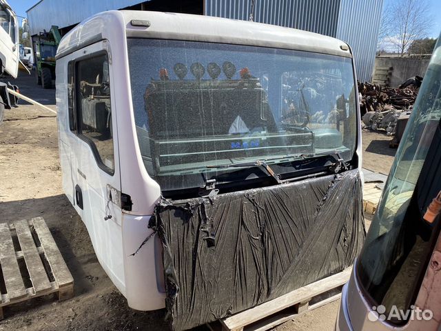 Кабина L низкая узкая MAN TGA D2066LF01 2005 Белая Кабина L низкая узкая MAN TGA D2066LF01 2005 Белая