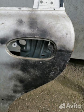 Дверь задняя левая Kia Spectra, б/у серебро