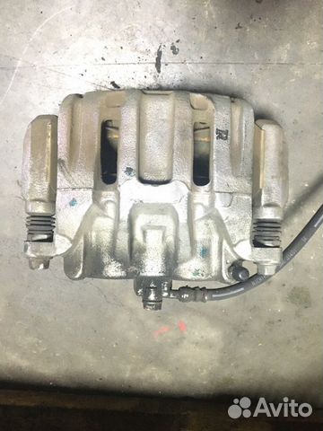 Суппорт тормозной передний правый Honda Crv 5