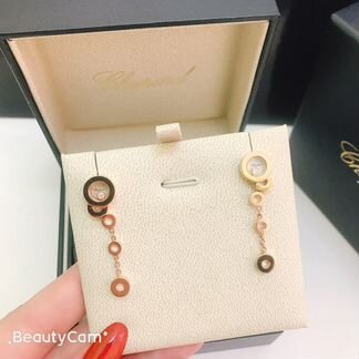Серьги Chopard из золота 750 пробы и бриллиантов