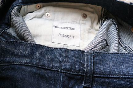 Джинсы клеш Prada