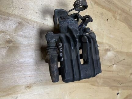 Суппорт задний правый левый Ауди А4 Б7