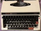 Пишущая машинка (с чёрным пластиковым чехлом)