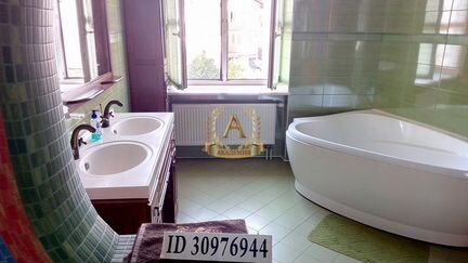 Коттедж 600 м² на участке 15 сот.